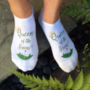 White no-show golf socks featuring the phrase "Queen of the Greens" printed on top, designed for stylish and confident women golfers. A perfect gift or tournament prize.