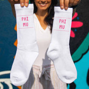 Phi Mu sorority name in sorority color digitally printed on comfy white cotton crew socks