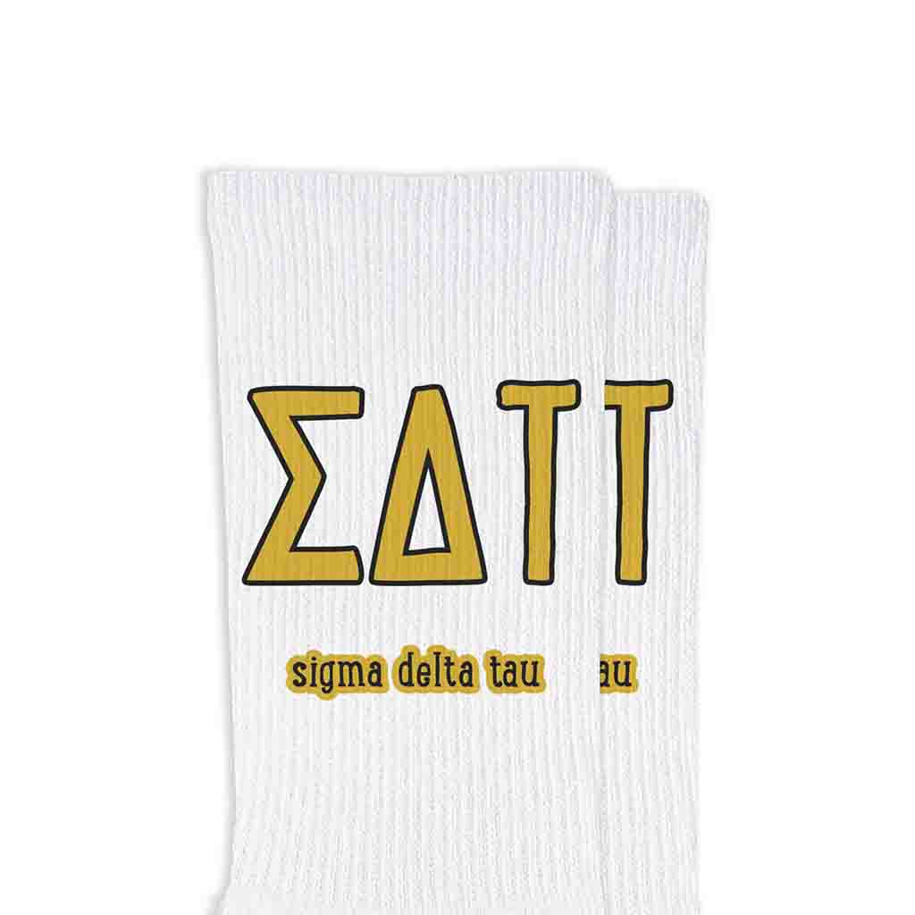 Sigma Delta Tau sorority letters and name digitally printed in sorority colors on white crew socks.