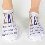 Sigma Delta Tau sorority letters and name digitally printed on white no show socks.