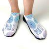 Cute white cotton gripper sole socks custom printed with self affirmation quote.