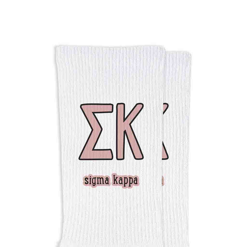 Sigma Kappa sorority letters and name digitally printed in sorority colors on white crew socks.