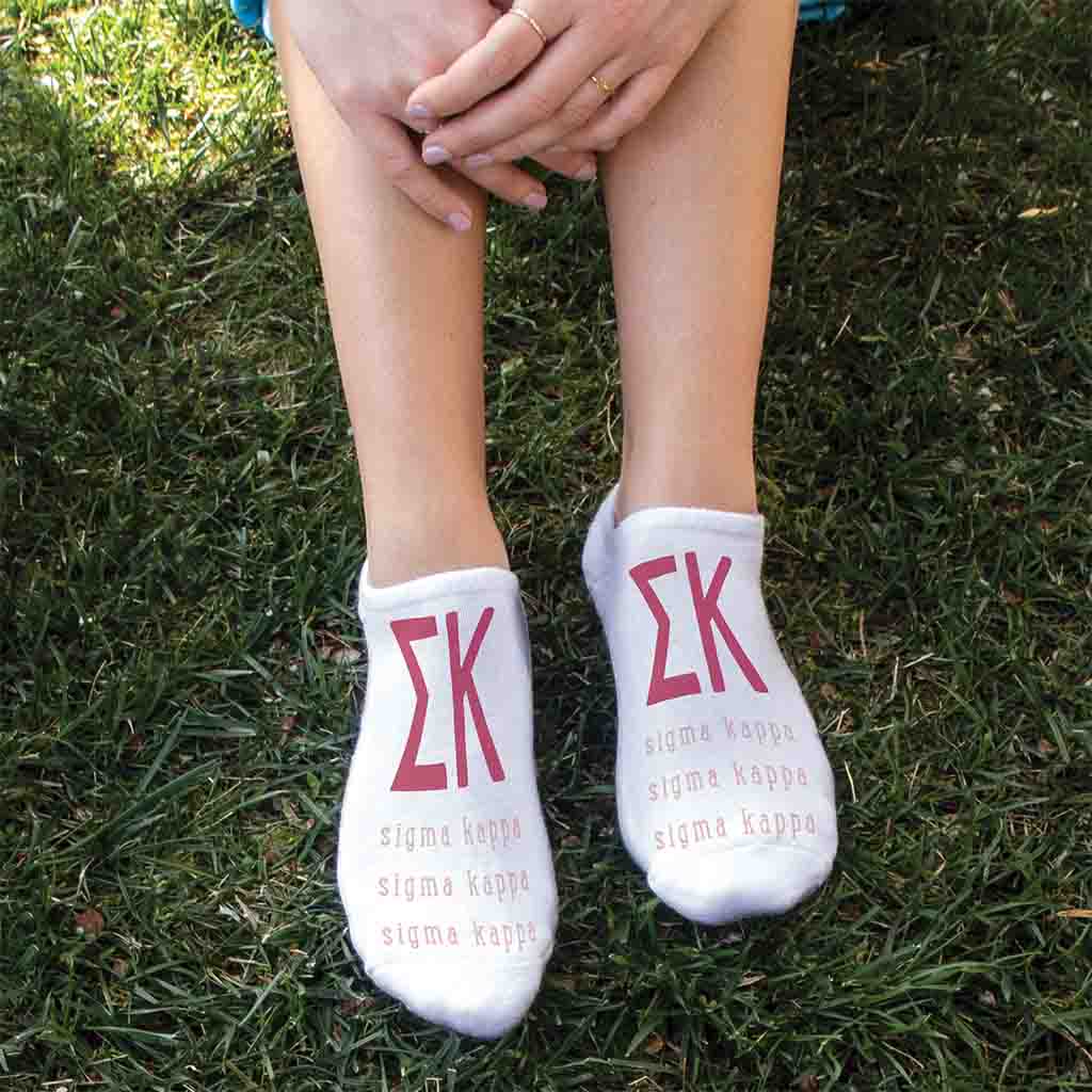 Sigma Kappa sorority letters and name digitally printed on white no show socks.