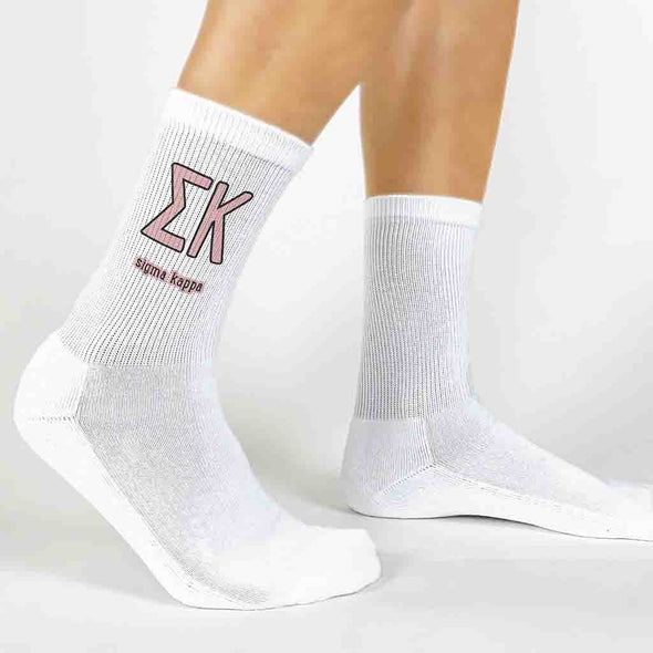 Sigma Kappa sorority letters and name digitally printed in sorority colors on white crew socks.
