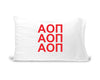 AOP sorority letters digitally printed in sorority colors on standard white cotton pillowcase.