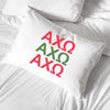 Alpha Chi Omega sorority letters custom printed on pillowcase.