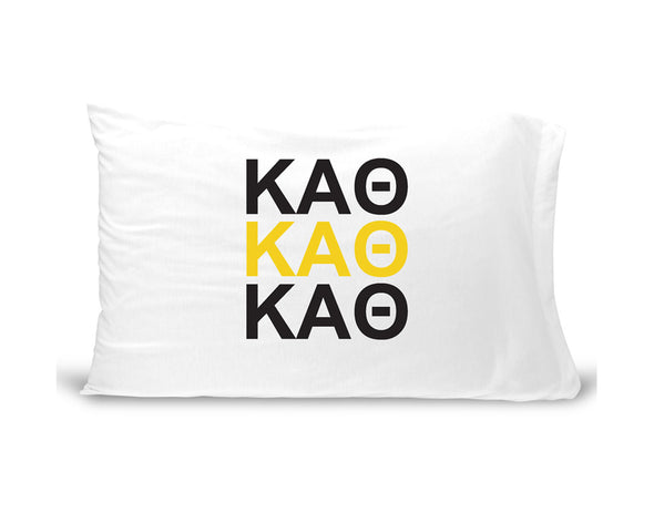KAT sorority letters digitally printed in sorority colors on standard white cotton pillowcase.
