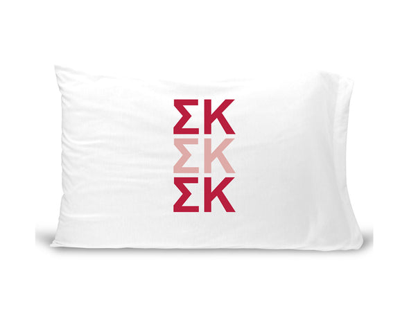 SK sorority letters digitally printed in sorority colors on standard white cotton pillowcase.