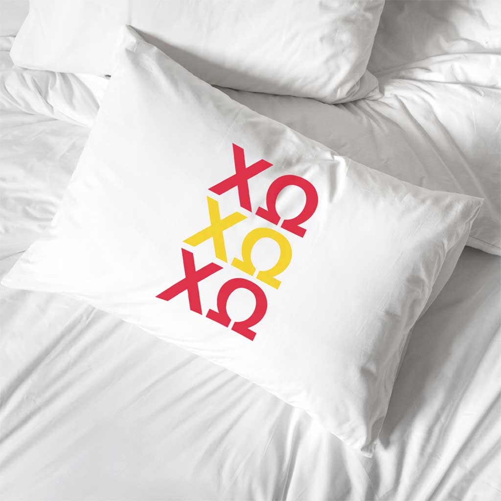 Chi Omega sorority letters digitally printed in sorority colors on standard white cotton pillowcase.