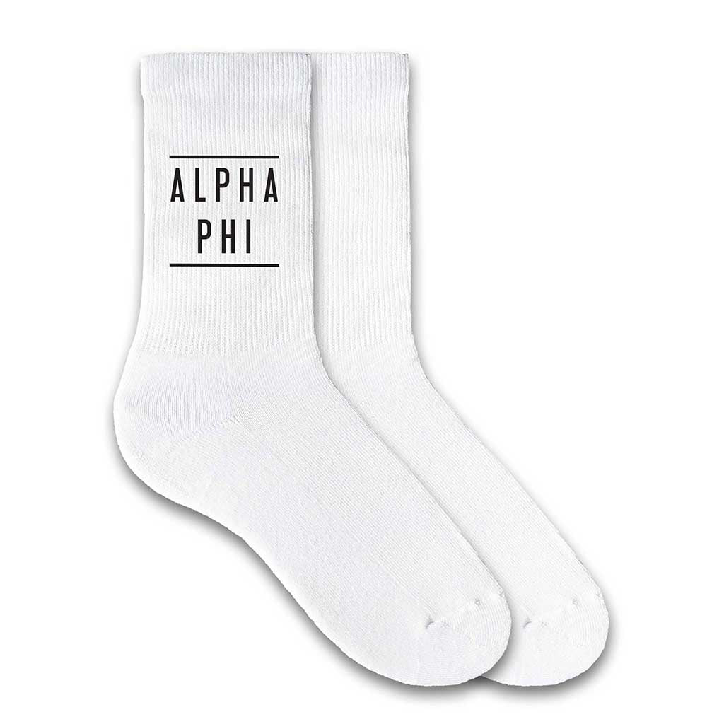 Alpha Phi sorority crew socks with the sorority name printed on the white cotton socks