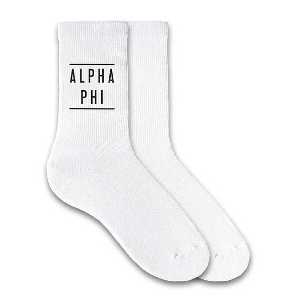Alpha Phi sorority crew socks with the sorority name printed on the white cotton socks