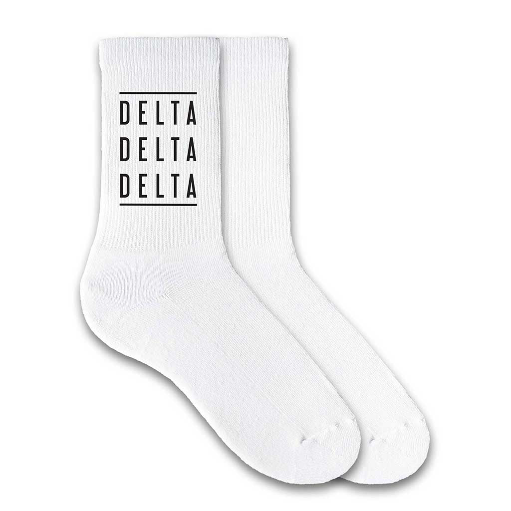 Delta Delta Delta sorority white cotton crew socks with sorority name printed on the socks