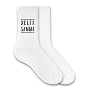 Delta Gamma sorority white cotton crew socks with sorority name printed on the socks