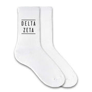 Delta Zeta sorority crew socks with sorority name printed on the socks