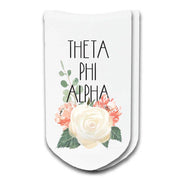 Theta Phi sorority socks with the sorority’s floral design printed on the socks