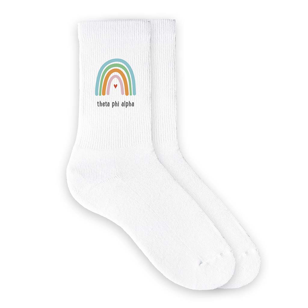 Cute Theta Phi Alpha sorority crew socks with rainbow design