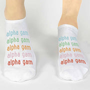 Alpha Gamma Delta sorority name custom printed in rainbow letters on comfy cotton no show socks
