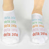 Delta Zeta sorority name printed in rainbow letter design on comfy cotton no show socks