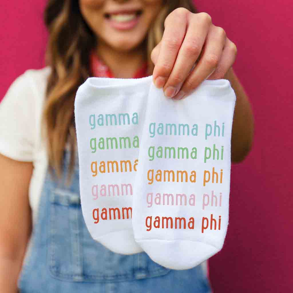 Gamma Phi Beta sorority name in repeating rainbow letter design custom printed on no show socks