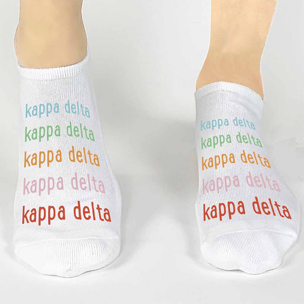 Kappa Delta sorority name in repeating rainbow letters custom printed on cotton no show socks 