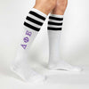 Delta Phi Epsilon sorority letters digitally printed in pink on comfy cotton black striped knee high socks