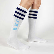 Kappa Kappa Gamma sorority letters printed on navy striped knee high socks