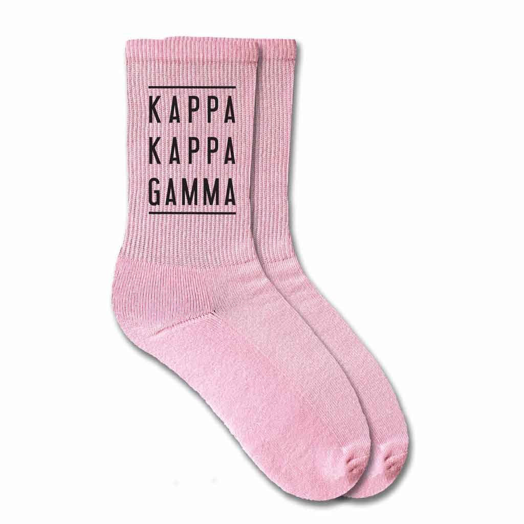 Kappa Kappa Gamma sorority pink cotton crew socks with sorority name printed on the socks