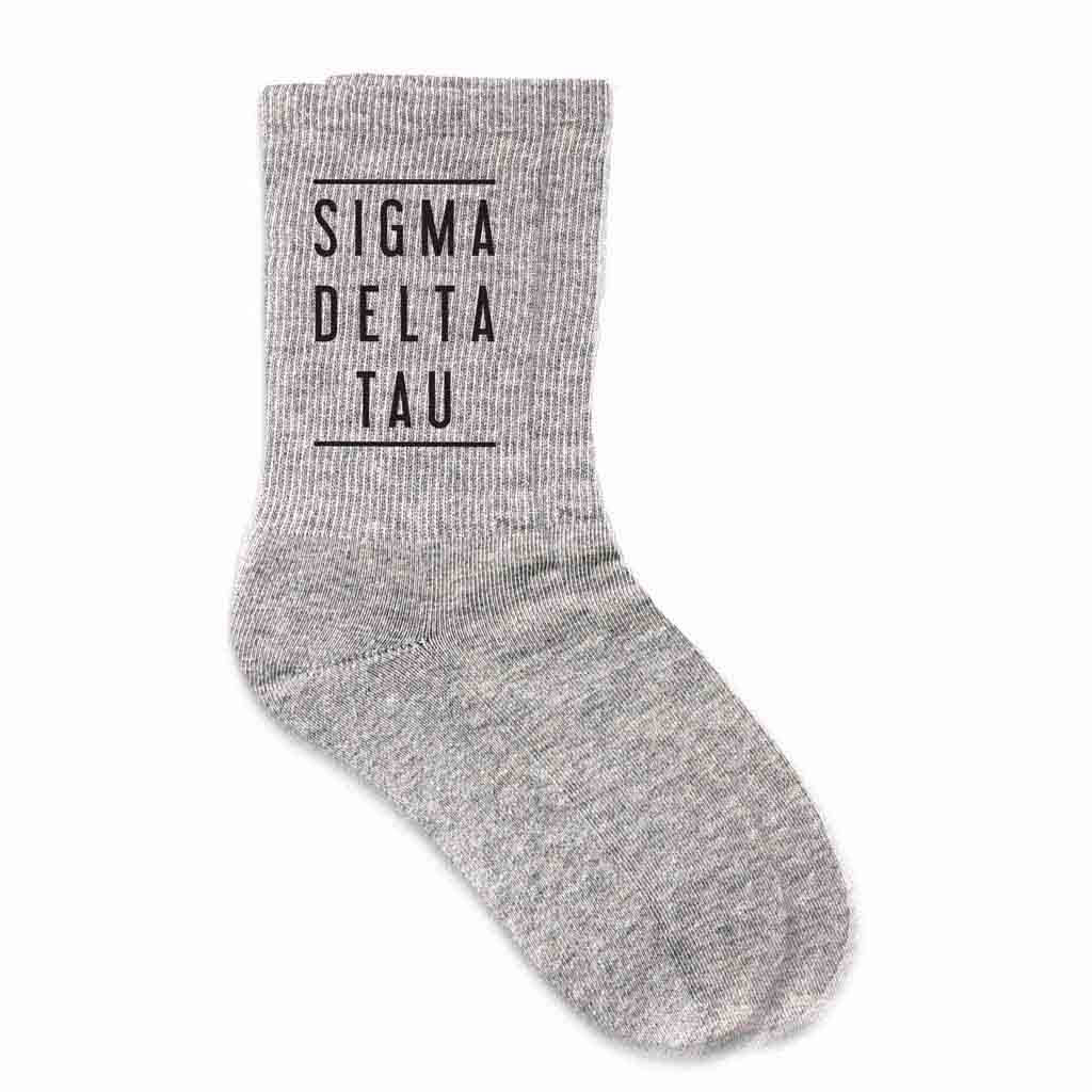 Sigma Delta Tau sorority name custom printed on heather gray cotton crew socks