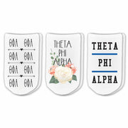 Theta Phi Alpha sorority no show socks with sorority name, Greek letters and sorority floral design sold as a 3 pair gift set