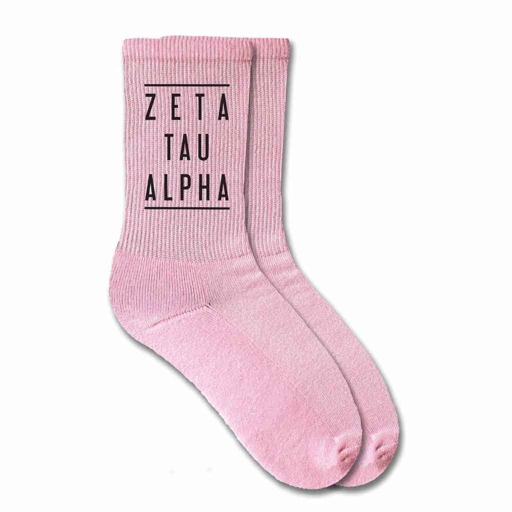 Zeta Tau Alpha sorority name custom printed on pink cotton crew socks
