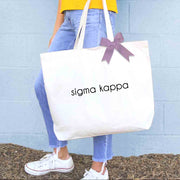 Sigma Kappa sorority name custom printed on canvas tote bag with bow