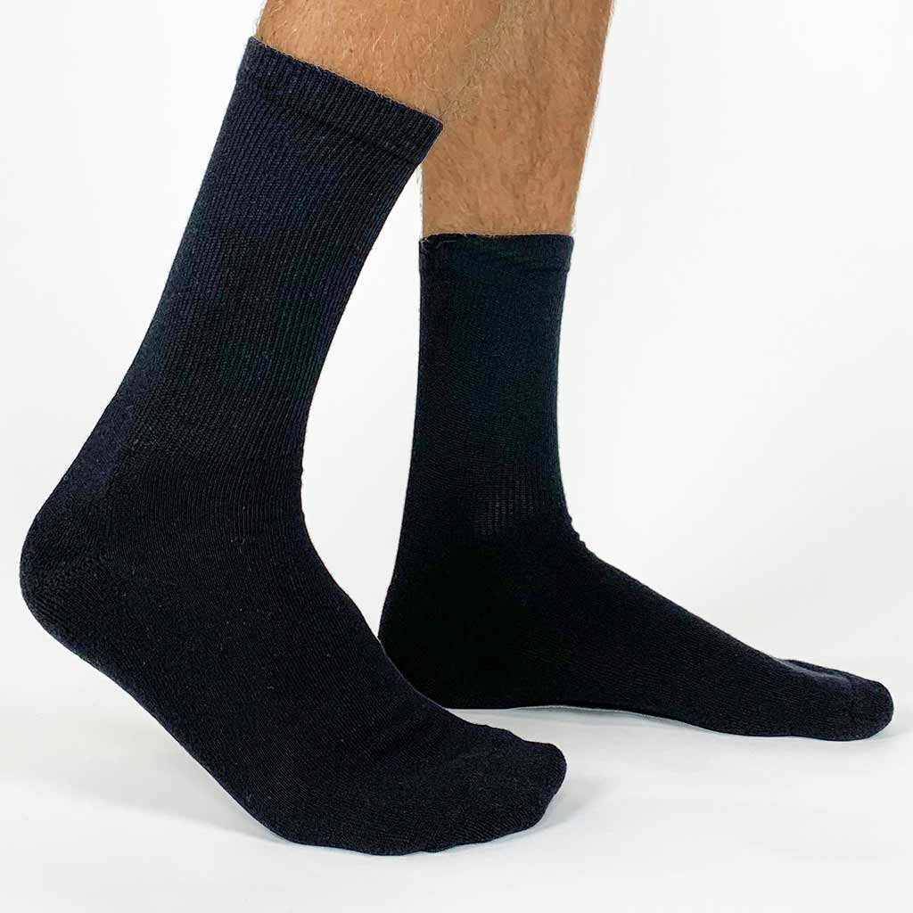 Black cotton crew socks can be custom printed by the pair with no minimums