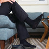 Black flat knit dress socks sold in a three pair set in same color and size by sockprints.