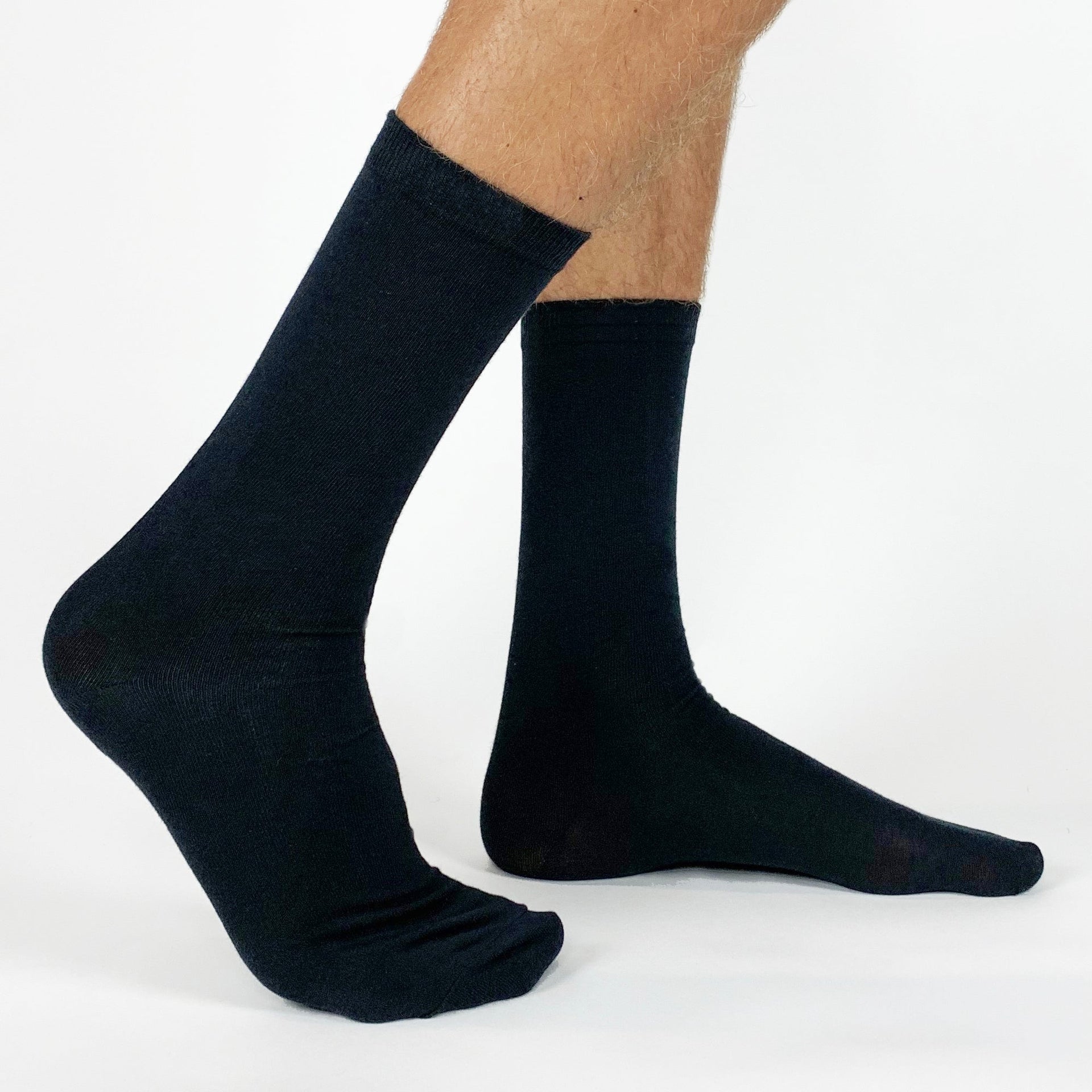 Sockprints Black flat knit dress socks blank sold by sockprints in a three pair pack.