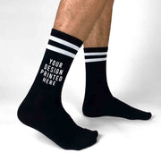 Custom printed striped crew socks available in black or white.