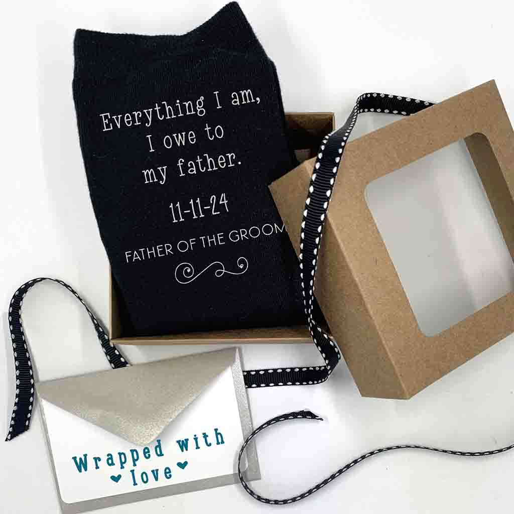 Personalized wedding socks for the father of the groom custom printed and personalized and a gift wrap kit included with purchase.