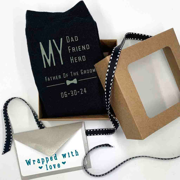 Personalized wedding socks for the father of the groom printed in colored ink with a gift wrapping kit included with purchase.