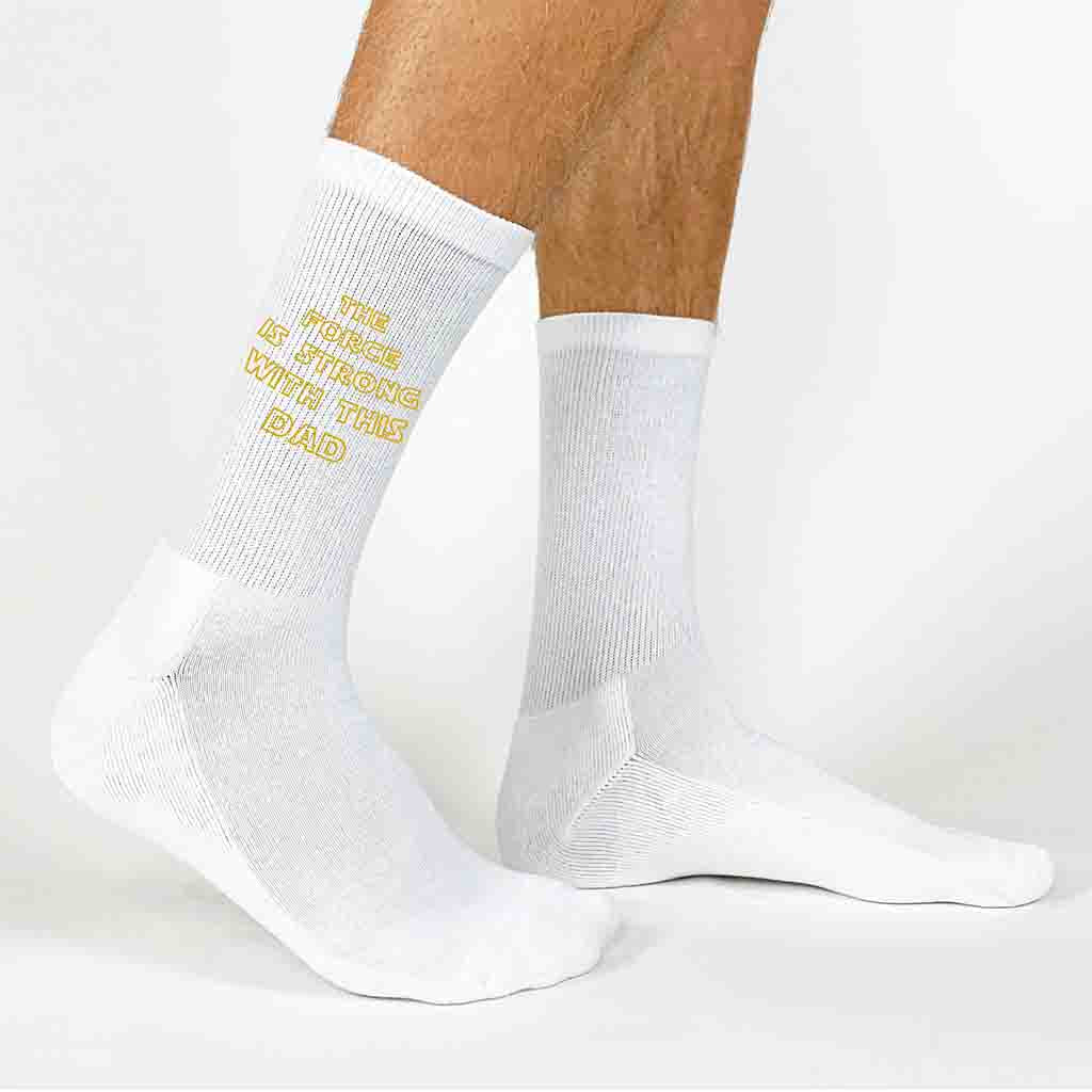 Fathers day crew socks digitally printed with classic saying the force is strong with this one.