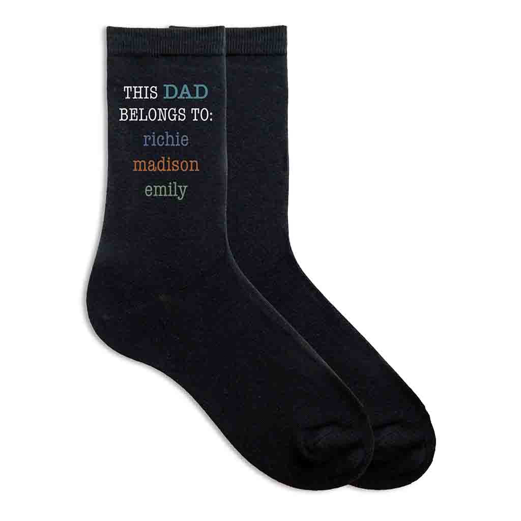 This Dad belongs to and his kids names digitally printed on the side of the socks.