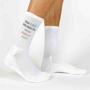 This Dad belongs to and his kids names digitally printed on the side of the socks.