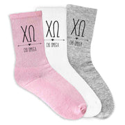 Chi Omega sorority letters and name digitally printed in a boho heart design on crew socks available in white, pink, or heather gray.