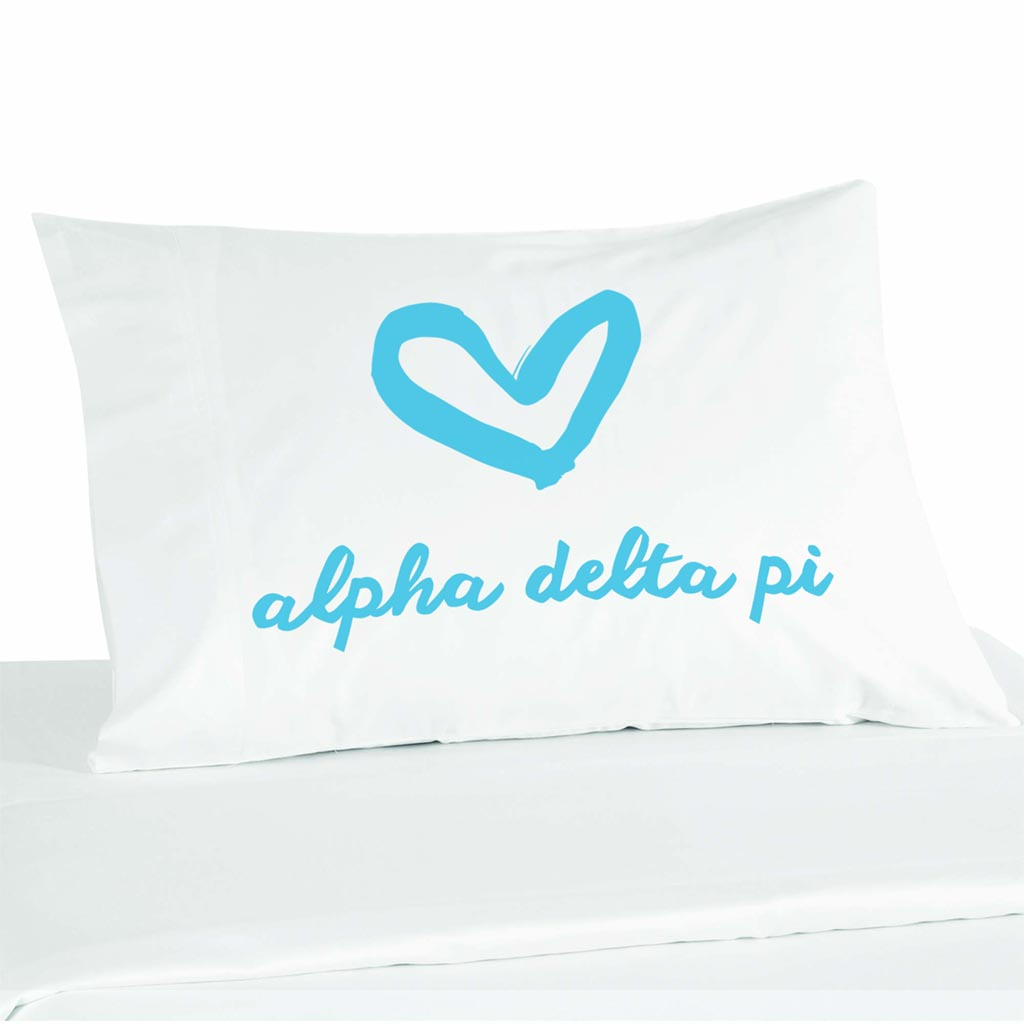 Alpha Delta Pi sorority name in handwriting with heart design digitally printed in sorority color ink on white cotton pillowcase.