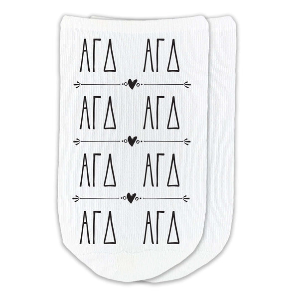 Alpha Gamma Delta sorority letters digitally printed in repeat boho style design on no show socks.