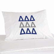 Delta Delta Delta sorority letters in sorority colors digitally printed on pillowcase.