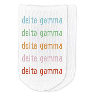 Delta Gamma sorority name in repeating rainbow letter design custom printed on comfy no show socks