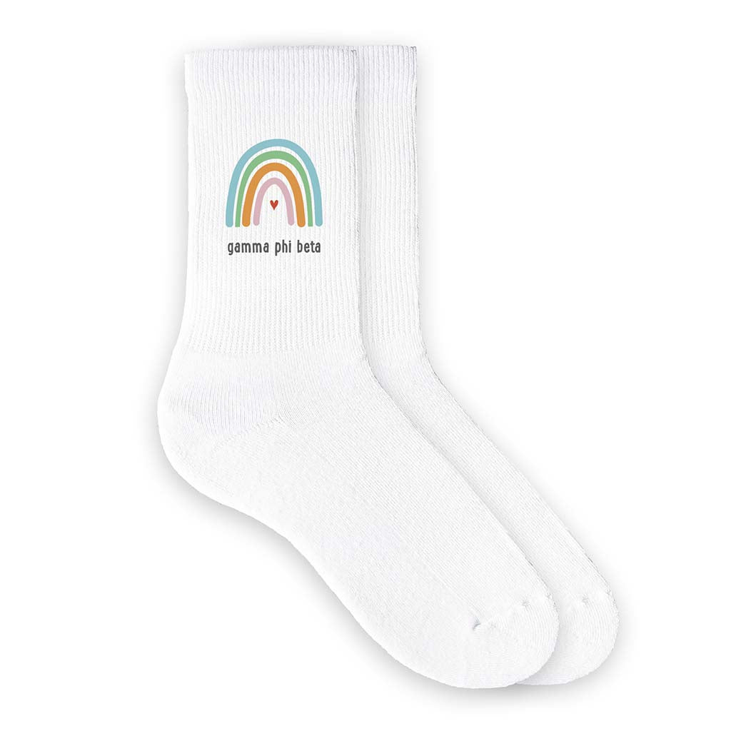 Custom Gamma Phi Beta sorority crew socks digitally printed with rainbow design.