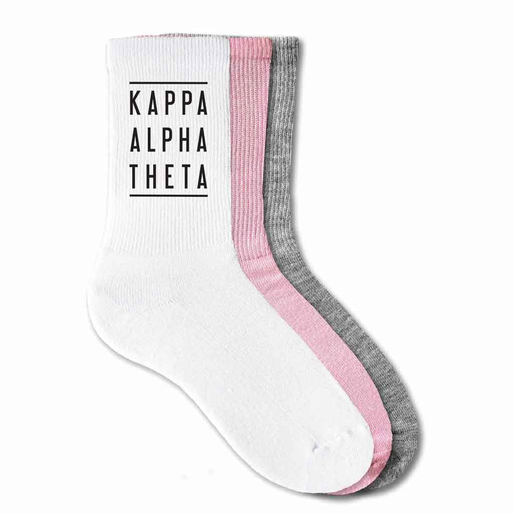 Kappa Alpha Theta sorority name custom printed on cotton crew socks available in white, pink, or heather gray