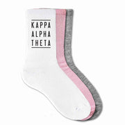 Kappa Alpha Theta sorority name custom printed on cotton crew socks available in white, pink, or heather gray