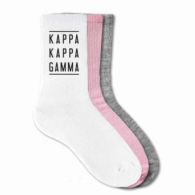 Kappa Kappa Gamma sorority name custom printed on cotton crew socks available in white, pink, or heather gray
