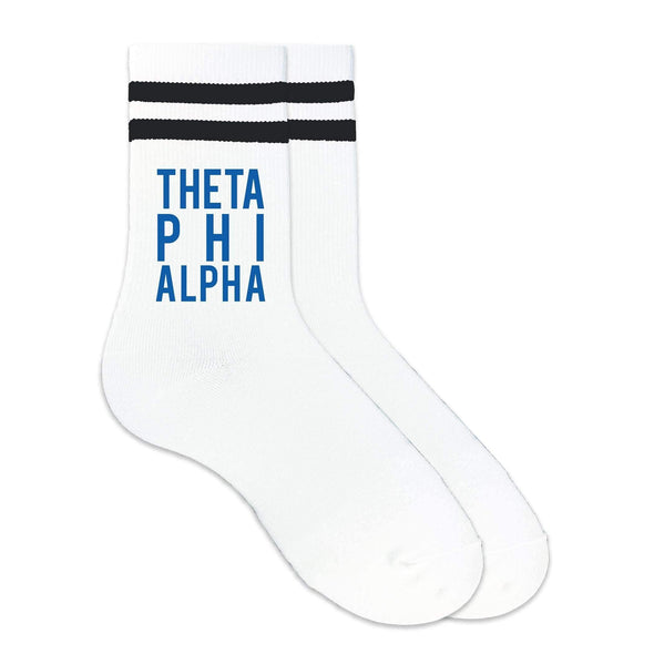 Theta Phi Alpha sorority name custom printed in sorority color on black striped crew socks